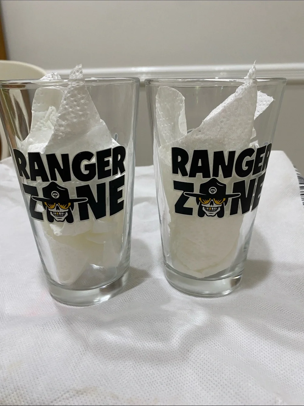 NWOT.  Set of 2, “Voodoo Ranger”, clear with black graphics, pint glasses.